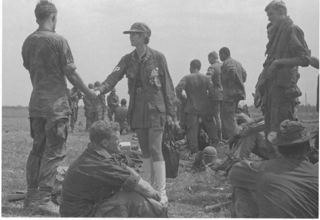 Jeri Lynn Mooney (Susan Howard) greeting Bob Huntsberger in VietNam - USO trip